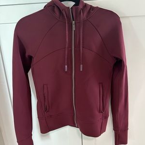 Lululemon zipper jacket with hood worn only twice in very good condition.